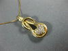 ESTATE .25CT DIAMOND 14KT YELLOW GOLD HEART LOVE KNOT INFINITY FLOATING PENDANT