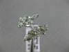 ESTATE WIDE 18KT WHITE GOLD LOVE RING. 3D MULTI LEAF CRISS CROSS DESIGN