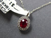 SMALL .62CT DIAMOND & AAA RUBY 18KT WHITE GOLD 3D ROUND & OVAL FLOWER PENDANT