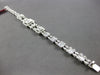 EXTRA LARGE 3.67CT DIAMOND 18KT WHITE GOLD 3D ROUND & BAGUETTE TENNIS BRACELET