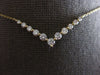 ESTATE .60CT DIAMOND 14KT YELLOW GOLD 3D ROUND GRADUATING V SHAPE LOVE NECKLACE