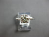 ESTATE .99CT DIAMOND 14KT WHITE GOLD 3D ROUND & BAGUETTE 3 STONE ENGAGEMENT RING
