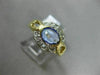 ESTATE .92CT DIAMOND & AAA OVAL TANZANITE 14KT YELLOW GOLD SEMI BEZEL LOVE RING