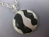EXTRA LARGE 1.42CT WHITE & BLACK DIAMOND 18KT WHITE GOLD CIRCULAR GLOBE PENDANT
