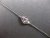 ESTATE .20CT FLAME CUT & ROUND DIAMOND 18KT WHITE GOLD LEAF BY THE YARD BRACELET
