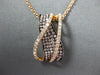 LARGE .75CT WHITE & PINK DIAMOND 18KT ROSE & BLACK GOLD CRISS CROSS WAVE PENDANT