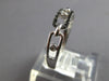 ESTATE .09CT WHITE & BLACK DIAMOND 14KT WHITE GOLD 3D OVAL LOVE KNOT FUN RING