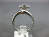 ESTATE .25CT WHITE & BLACK DIAMOND 14KT WHITE GOLD FLOWER CRISS CROSS FUN RING