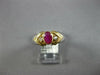 ESTATE .72CT DIAMOND & AAA RUBY 14KT YELLOW GOLD OVAL & ROUND DOUBLE V FUN RING