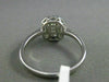 ESTATE WIDE .53CT ROUND & BAGUETTE DIAMOND 18KT WHITE GOLD CLUSTER PROMISE RING