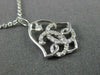 ESTATE .13CT DIAMOND 14K WHITE GOLD 3D CLASSIC OPEN FILIGREE BELL LOVE PENDANT