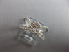 ESTATE LARGE .64CT DIAMOND 14KT WHITE GOLD FLOWER CRISS CROSS INFINITY LOVE RING