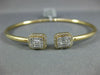 .79CT DIAMOND 18KT YELLOW GOLD ROUND & BAGUETTE CLUSTER FLEXIBLE BANGLE BRACELET