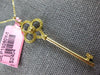 LARGE .18CT FANCY YELLOW DIAMOND 18KT YELLOW GOLD 3D KEY TO YOUR HEART PENDANT