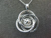 .50CT DIAMOND & AAA SOUTH SEA PEARL 14KT WHITE GOLD LOVE KNOT INFINITY PENDANT
