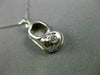 ESTATE .03 DIAMOND 14KT WHITE GOLD HANDCRAFTED BOW BABY GIRL SHOE PENDANT #21949