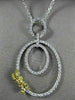 ESTATE LARGE .52CT WHITE & FANCY YELLOW DIAMOND 18K 2 TONE GOLD OVAL BOW PENDANT