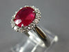 2.46CT DIAMOND & AAA RUBY 18KT WHITE GOLD 3D OVAL & ROUND FLOWER ENGAGEMENT RING