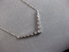 .59CT DIAMOND 14KT WHITE GOLD 3D GRADUATING V SHAPE SHARED PRONG LOVE NECKLACE