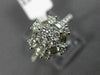 WIDE .89CT ROUND & BAGUETTE DIAMOND 18KT WHITE GOLD OCTAGON FLOWER CLUSTER RING