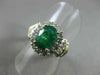 ESTATE 1.82CT ROUND & BAGUETTE DIAMOND & AAA EMERALD 14K TWO TONE GOLD HALO RING