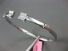 WIDE .72CT DIAMOND 18KT WHITE GOLD 3D ROUND & BAGUETTE FLEXIBLE BANGLE BRACELET