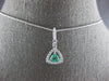 .50CT DIAMOND & AAA EMERALD 18KT WHITE GOLD 3D TRILLION & ROUND FLOATING PENDANT