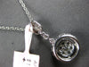 .52CT DIAMOND 14KT WHITE GOLD 3D ROUND & BAGUETTE CLUSTER HALO FLOATING PENDANT