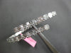 LARGE 5.83CT DIAMOND 18K WHITE GOLD INVISIBLE CRISS CROSS FLEXIBLE CUFF BRACELET