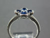 .84CT DIAMOND & AAA SAPPHIRE 18KT WHITE GOLD ROUND & PEAR SHAPE FLOWER LOVE RING