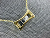 ESTATE .17CT DIAMOND 18KT 2 TONE GOLD 3D 3 STONE ETOILE FLOATING LOVE PENDANT