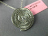 ESTATE .83CT DIAMONDS 18KT WHITE GOLD CIRCULAR MULTI ROW SWIRL SOLITAIRE PENDANT