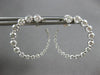 2.09CT DIAMOND 18KT WHITE GOLD GRADUATING JOURNEY SIDEWAYS HOOP HANGING EARRINGS