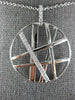ESTATE LARGE .21CT DIAMOND 18KT WHITE GOLD CIRCULAR CRISS CROSS WEB FUN PENDANT