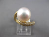 LARGE .48CT DIAMOND & AAA SOUTH SEA PEARL 14KT YELLOW GOLD CRISS CROSS LOVE RING