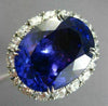 ESTATE EXTRA LARGE 31.4CT DIAMOND & AAA EXTRA FACET TANZANITE PLATINUM HALO RING