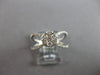 ESTATE LARGE .64CT DIAMOND 14KT WHITE GOLD FLOWER CRISS CROSS INFINITY LOVE RING