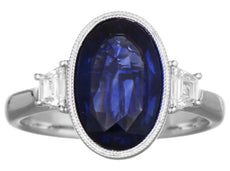 LARGE 3.53CT DIAMOND & AAA SAPPHIRE 18KT WHITE GOLD OVAL & TRAPEZOID BEZEL RING