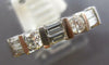 ESTATE .64CT DIAMOND 14KT WHITE GOLD ROUND & BAGUETTE CLASSIC ANNIVERSARY RING
