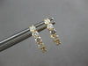 ESTATE .62CT DIAMOND 18KT YELLOW GOLD ROUND 5 STONE SHARED PRONG HUGGIE EARRINGS