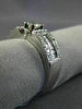 ESTATE .90CT ROUND & BAGUETTE DIAMOND 14KT WHITE GOLD FOUR PRONG ENGAGEMENT RING