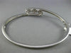 ESTATE .10CT DIAMOND 14KT WHITE GOLD PAST PRESENT FUTURE FLOWER BANGLE BRACELET