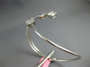 WIDE .77CT DIAMOND 18KT WHITE GOLD ROUND & BAGUETTE FLEXIBLE FUN BANGLE BRACELET
