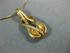 ESTATE .25CT DIAMOND 14KT YELLOW GOLD HEART LOVE KNOT INFINITY FLOATING PENDANT