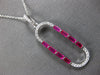 .74CT DIAMOND & AAA RUBY 14K WHITE GOLD 3D BAGUETTE & ROUND FUN FLOATING PENDANT