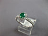 .72CT DIAMOND & AAA EMERALD 18KT WHITE GOLD 3D OVAL & ROUND HALO ENGAGEMENT RING