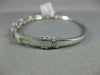 1.24CT DIAMOND 18KT WHITE GOLD 3D FLOWER CLUSTER SEMI ETERNITY BANGLE BRACELET