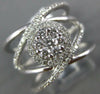 LARGE .65CT DIAMOND 18K WHITE GOLD CLUSTER CRISS CROSS FLOWER HALO INFINITY RING