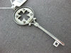 .09CT DIAMOND 14KT WHITE GOLD ETOLIE FOUR LEAF CLOVER KEY TO YOUR HEART PENDANT