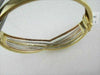 ANTIQUE WIDE DIAMOND 18K TRICOLOR GOLD MULTI ROW BANGLE